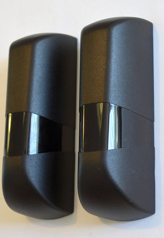A pair of infrared gate safety beams.