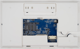 4G_wireless_alarm_panel_photo_of_the_inside. White 4G alarm panel with the back cover removed showing the sim slot and various electronic components, connectors, and mounting slots.