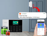 A picture of a phone getting a warning from the wireless burglar alarm panel to say a door sensor has a low battery.