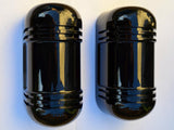A pair of wired infrared dual beam detectors.